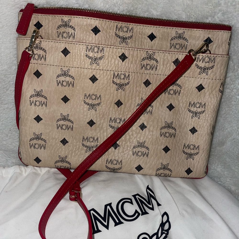 MCM crossbody bag in red/cream/black color.